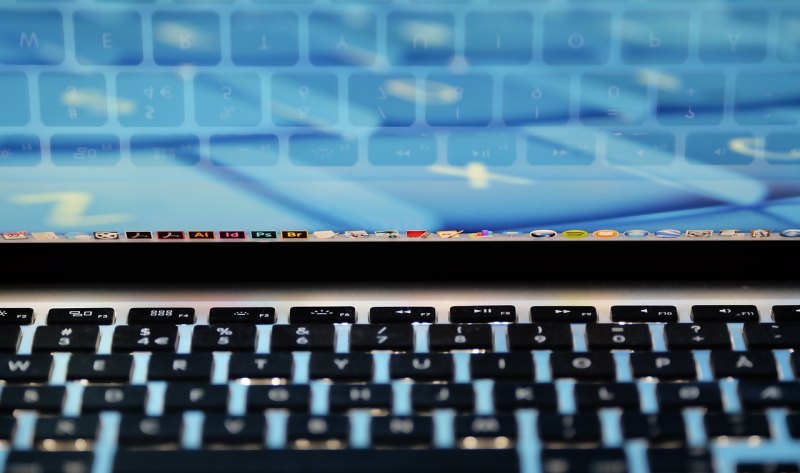 Macbook分屏功能怎么设置 苹果电脑怎么分屏